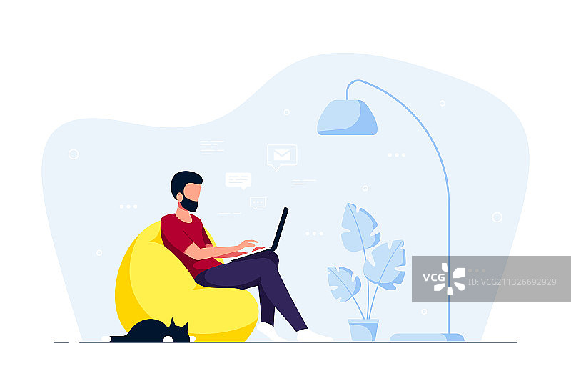 在家坐在椅子上工作的年轻男人图片素材