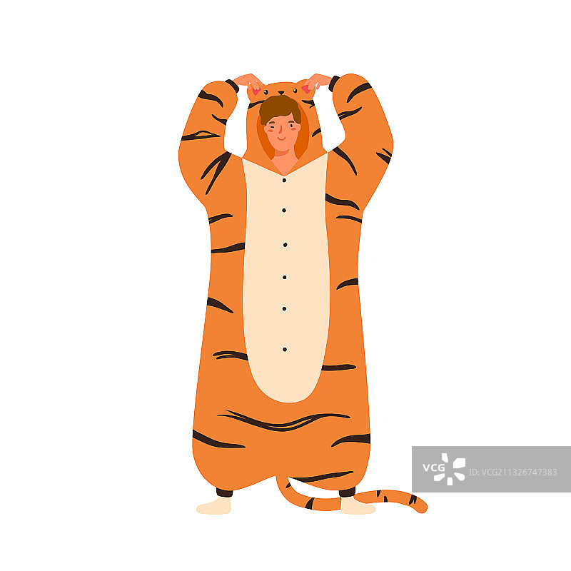 滑稽的年轻人穿着老虎睡衣图片素材