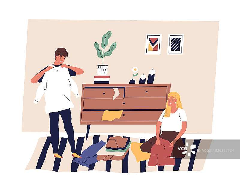 一对夫妇整理折叠和收纳图片素材