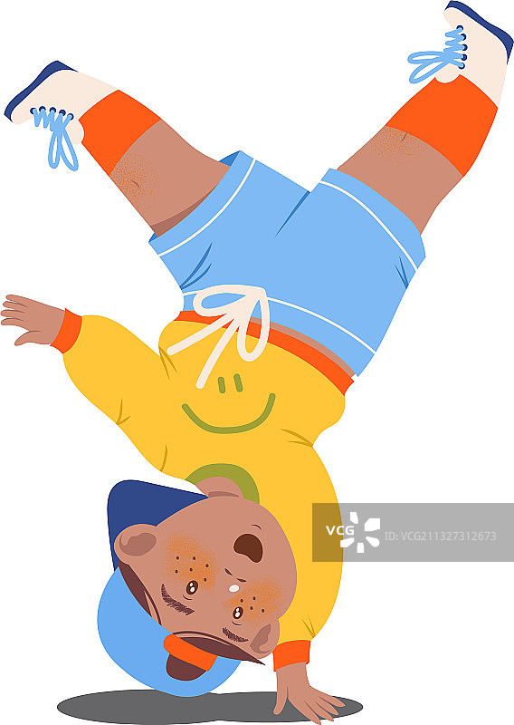 有趣的男孩跳嘻哈舞，做倒立动作图片素材