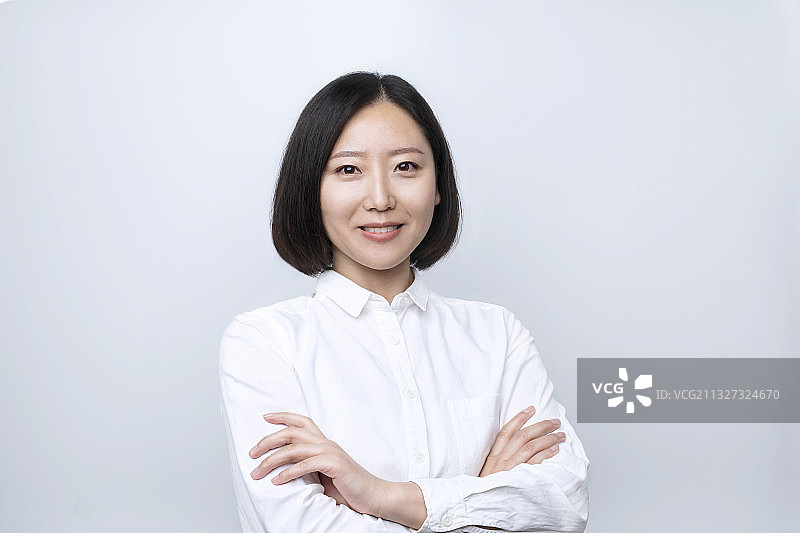 一个穿白衬衣的亚洲商务女性图片素材