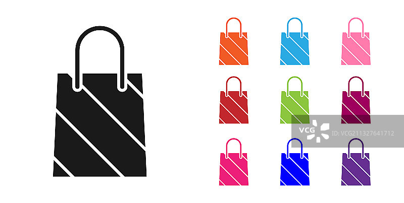 隔离的黑色圣诞纸购物袋图标图片素材