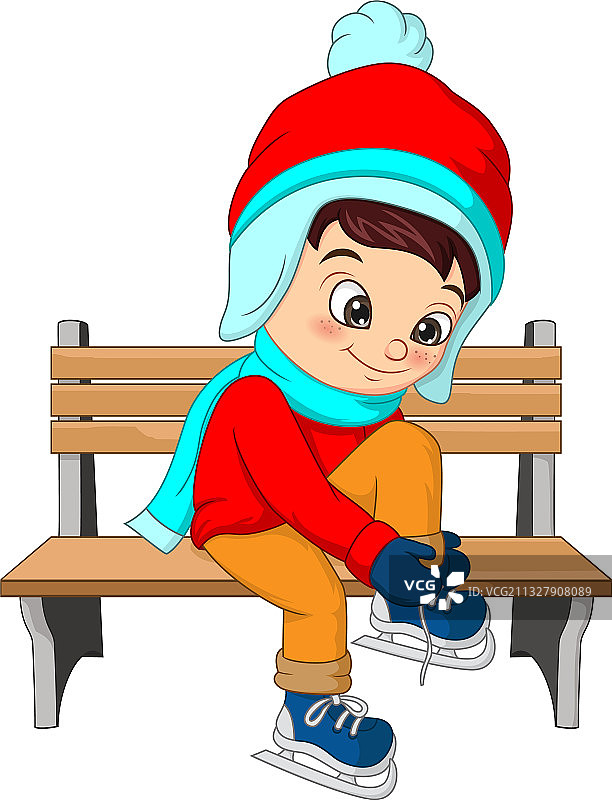 穿着冬装坐在长椅上的可爱男孩图片素材