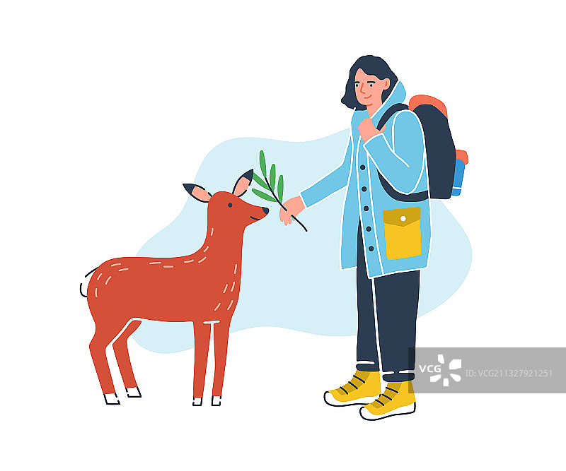 背着旅行背包的女旅行者在喂食图片素材