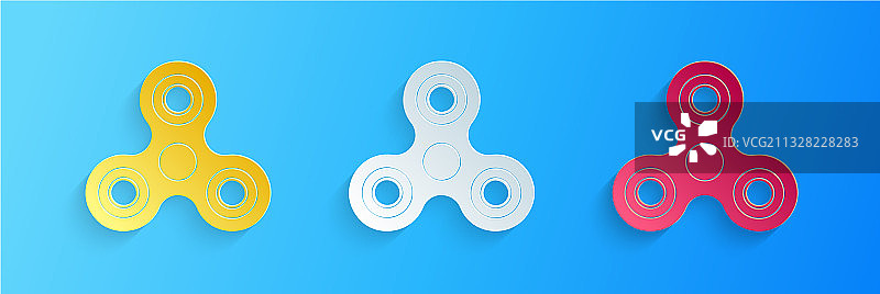 蓝色背景上的剪纸指尖陀螺图标图片素材