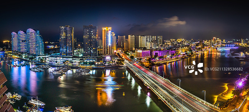 三亚海天盛筵城市中心地标建筑游艇夜景航拍视角全景图图片素材