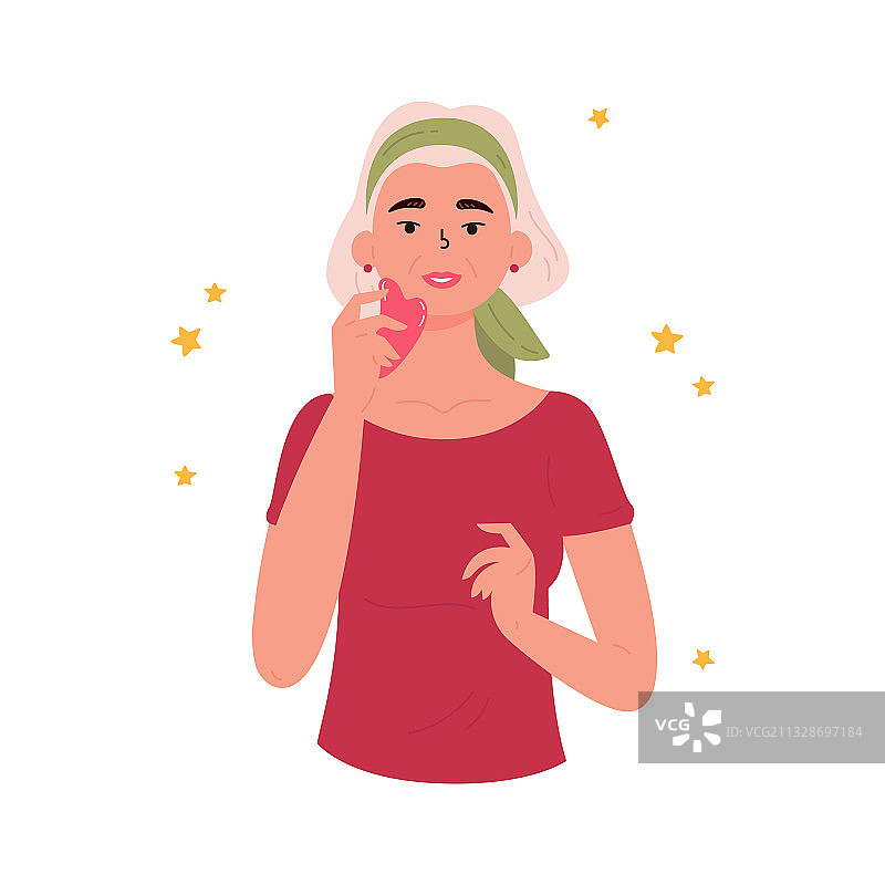 女人用刮痧石进行面部刮痧按摩图片素材