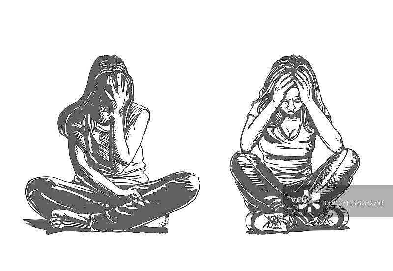 坐在地板上悲伤沮丧的女孩图片素材