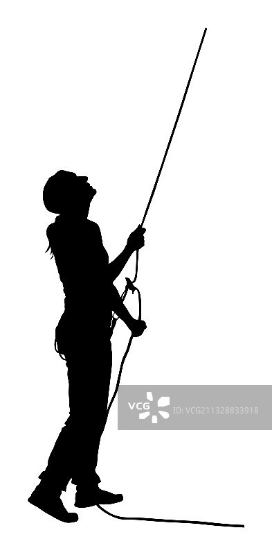 在攀岩教练指导下使用绳索的女人图片素材