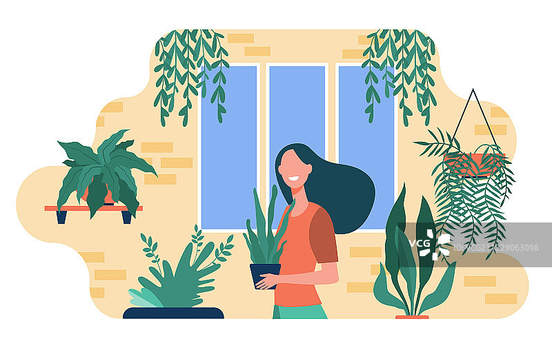 种植室内植物的快乐女人图片素材