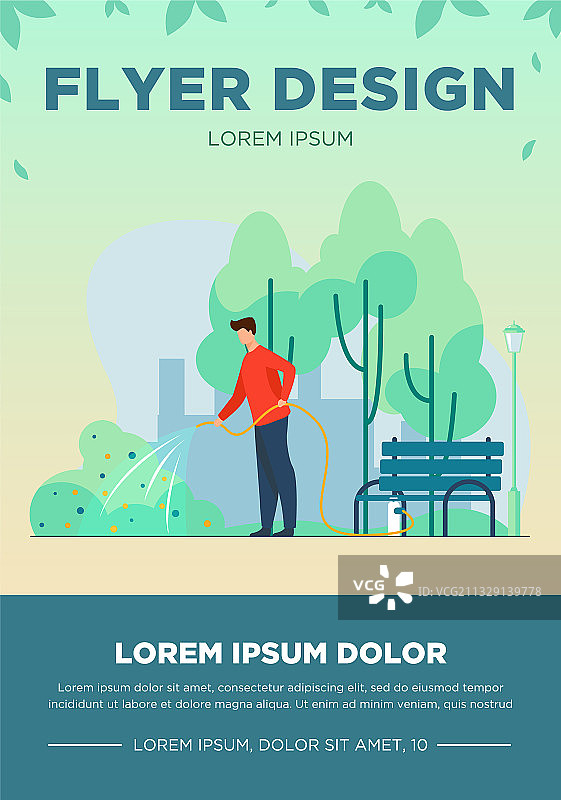 城市公园里男人用水管浇灌灌木图片素材