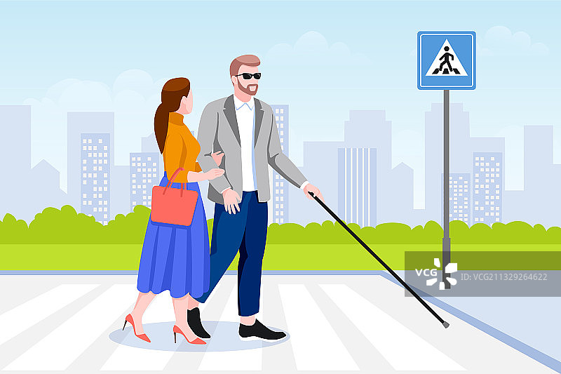 女人帮助盲人过马路图片素材