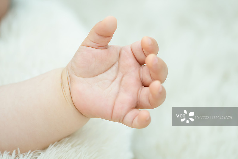 婴儿的手部特写图片素材