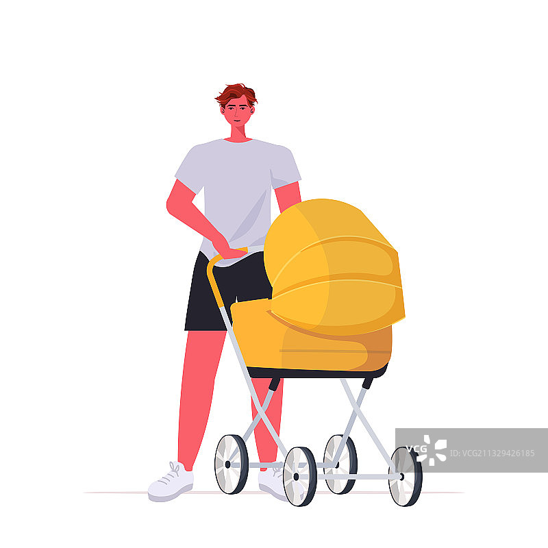 年轻的父亲带着新生儿在户外散步图片素材