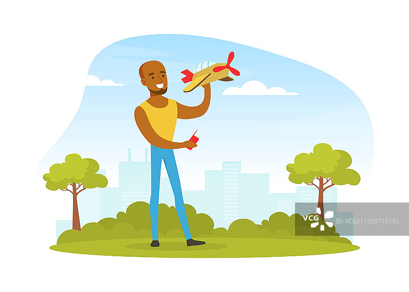 年轻人发射无线电控制的飞机图片素材