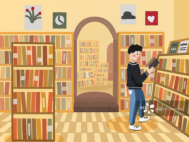 男孩在书店看书图片素材
