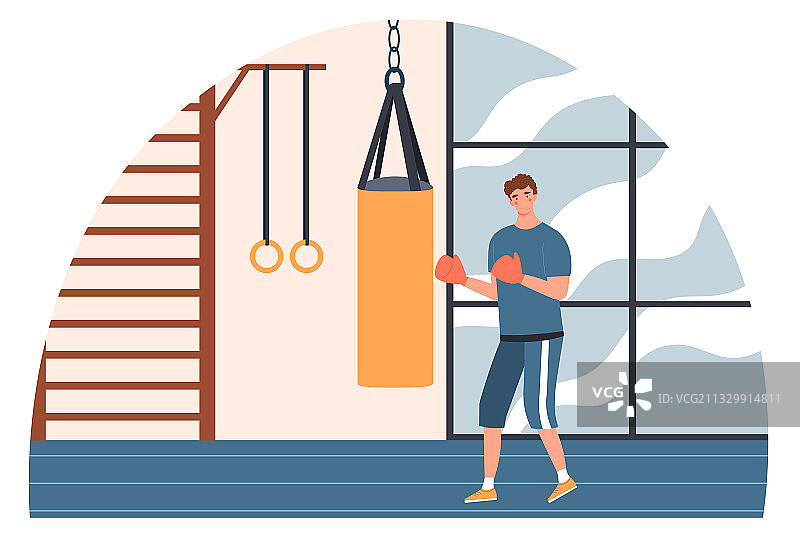 男人在健身房里打拳击沙袋图片素材