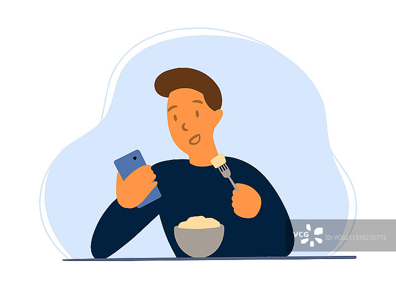 午餐时用手机的年轻男人图片素材