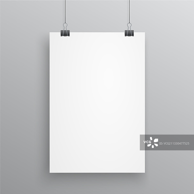 用曲别针挂在白色背景上的空白A4纸图片素材