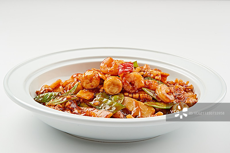 白色瓷盘装的传统天津名菜八珍豆腐图片素材