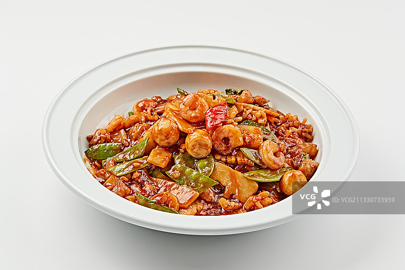 白色瓷盘装的传统天津名菜八珍豆腐图片素材