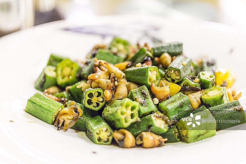 海南美食秋葵炒螺肉图片素材