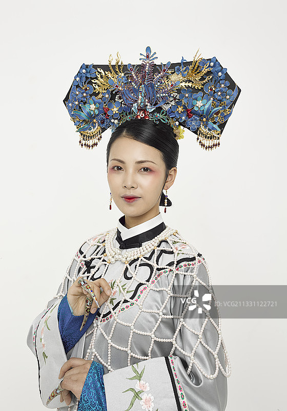 白色背景下的清代女性古装造型清朝古装图片素材