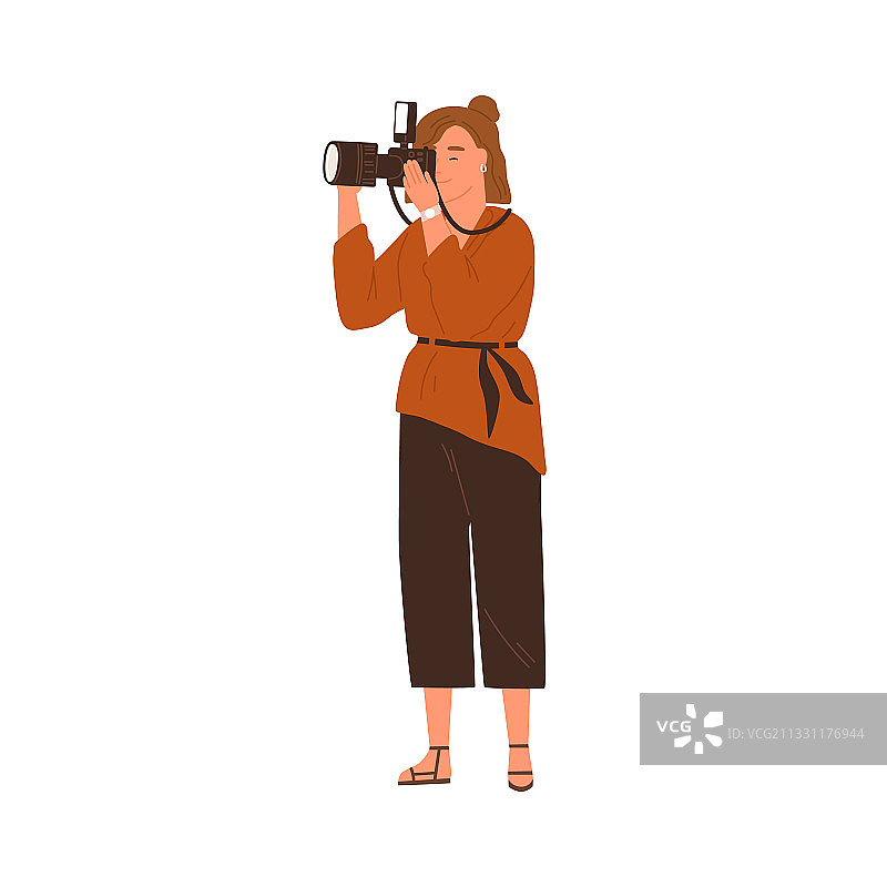 手持数码相机的职业女摄影师图片素材