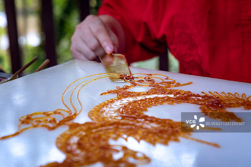 中国非遗项目成都糖画图片素材