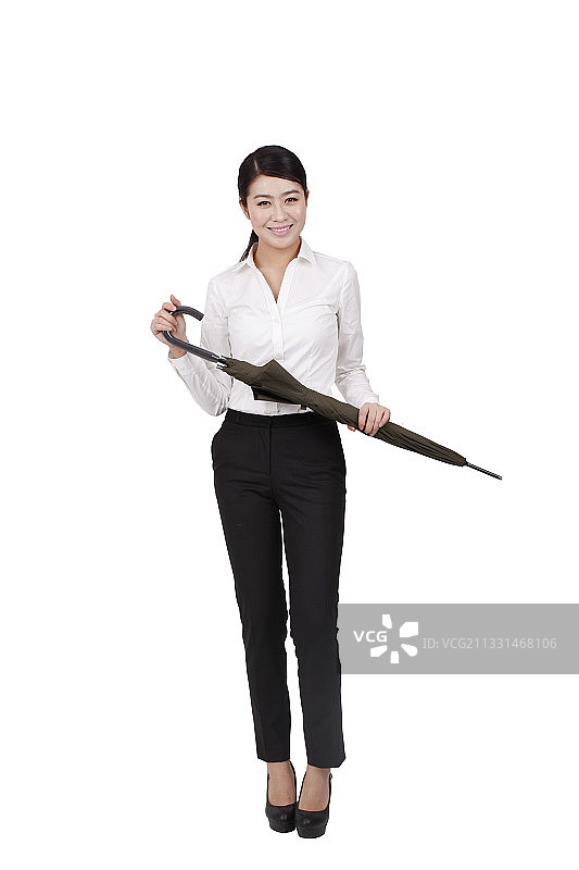 女商人手持铅笔，白色背景图片素材