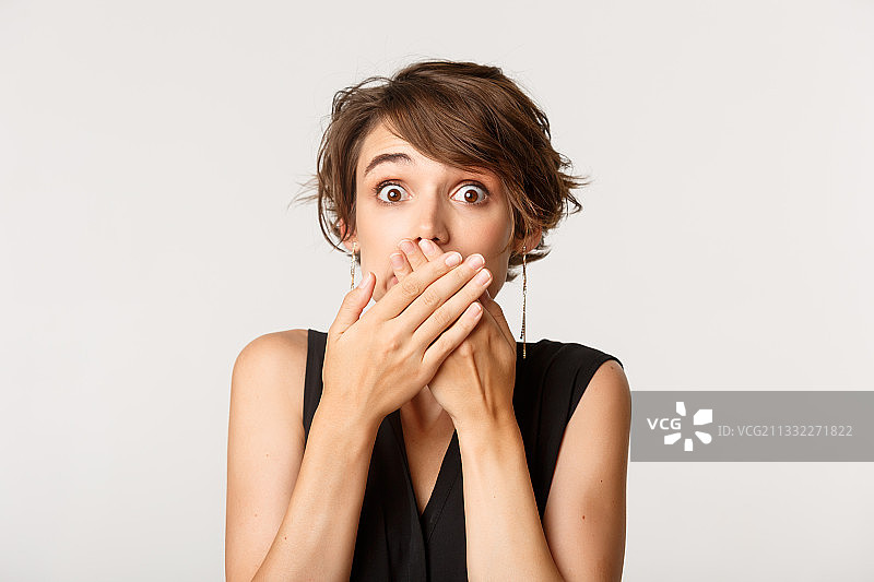 震惊的女人白色背景肖像图片素材