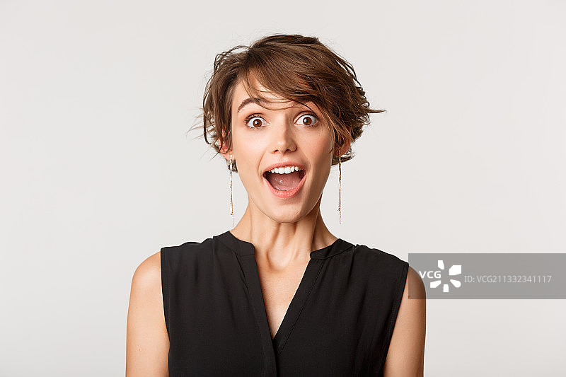 震惊的女人白色背景肖像图片素材