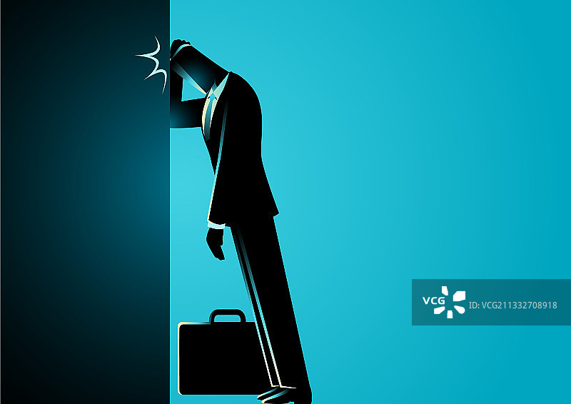 额头抵在墙上的商人图片素材