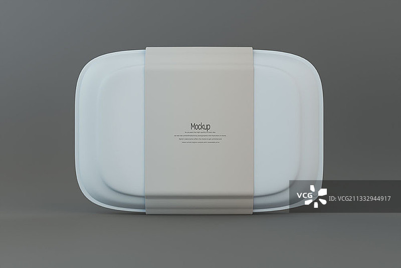 灰色背景上的塑料午餐盒样机图片素材