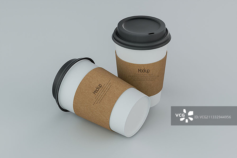 灰色背景上的两个一次性咖啡杯样机编辑图像图片素材