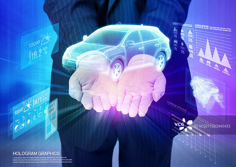 蓝色背景上手捧汽车全息影像图片素材