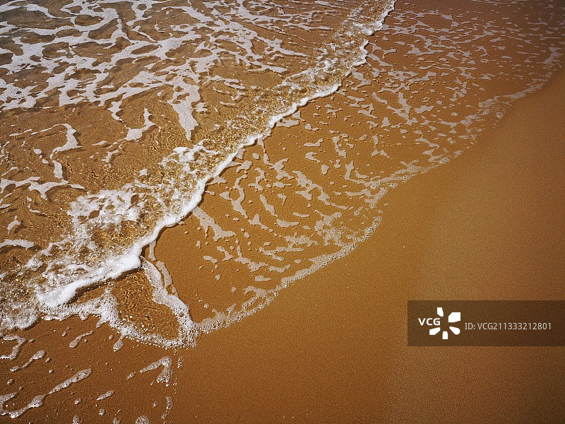 反复冲刷的海滩是如此的平滑，犹如我的心。图片素材