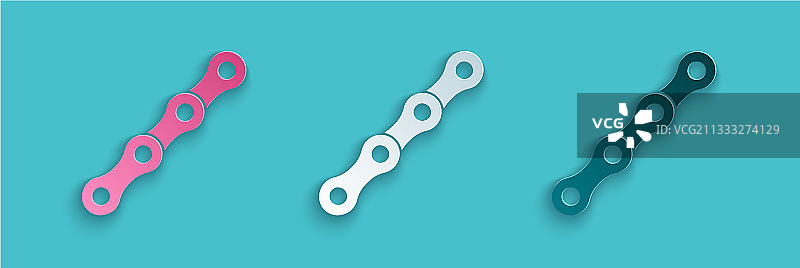 蓝色背景上的剪纸自行车链条图标图片素材