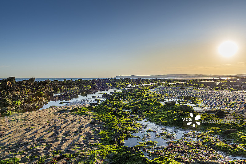 法国加来海峡省格里内角海滩日出岩石图片素材