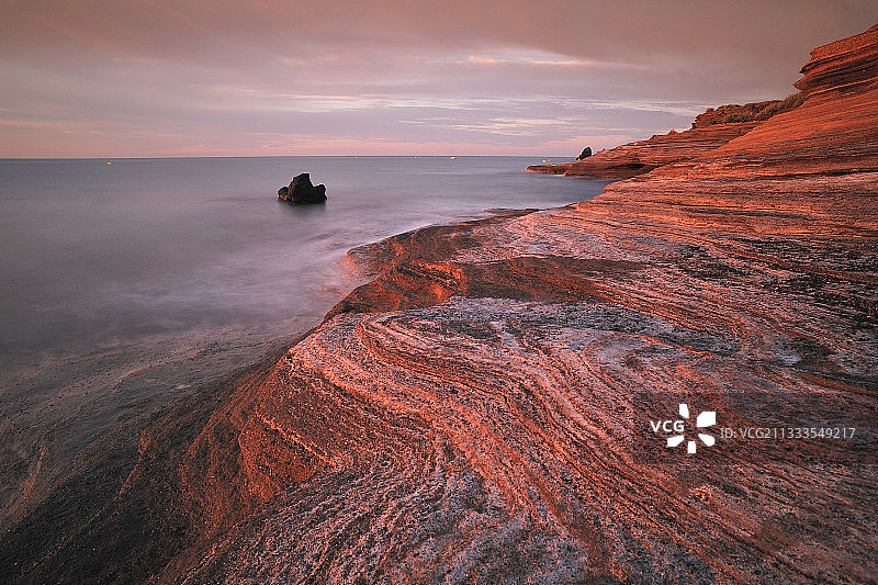 地中海日出，法国埃罗省阿格德角图片素材