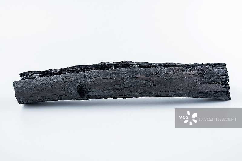 白背景上一根黑木炭图片素材