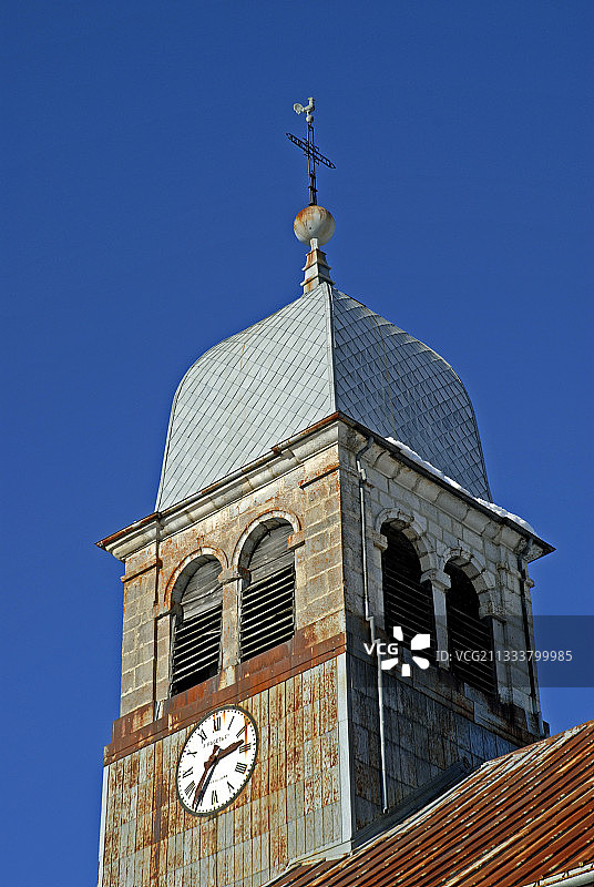 法国汝拉省贝尔方丹的带涂层覆盖的钟楼图片素材