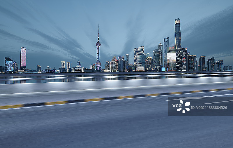 上海陆家嘴地标摩天大楼夜景和道路速度特效图片素材