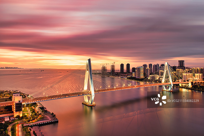 海口世纪大桥晚霞海南自由贸易港图片素材