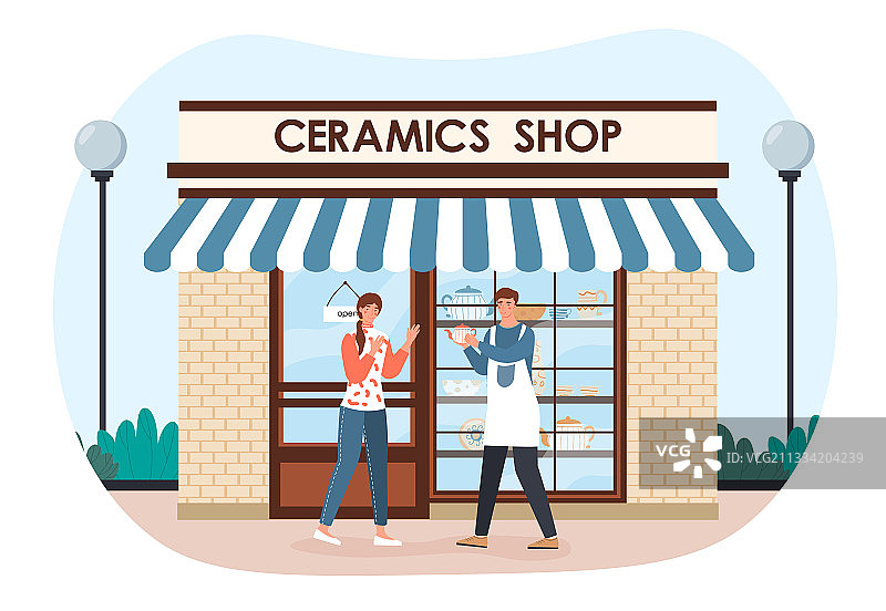 陶瓷店男店主展示陶瓷罐图片素材