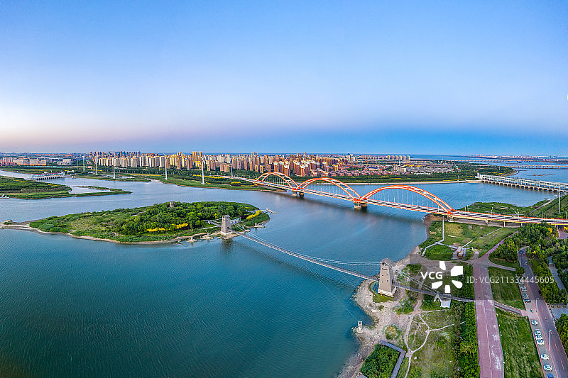 天津市滨海新区中新生态城北塘古镇彩虹桥航拍全景图图片素材