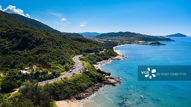 海南省万宁市石梅湾海边公路航拍视角图片素材