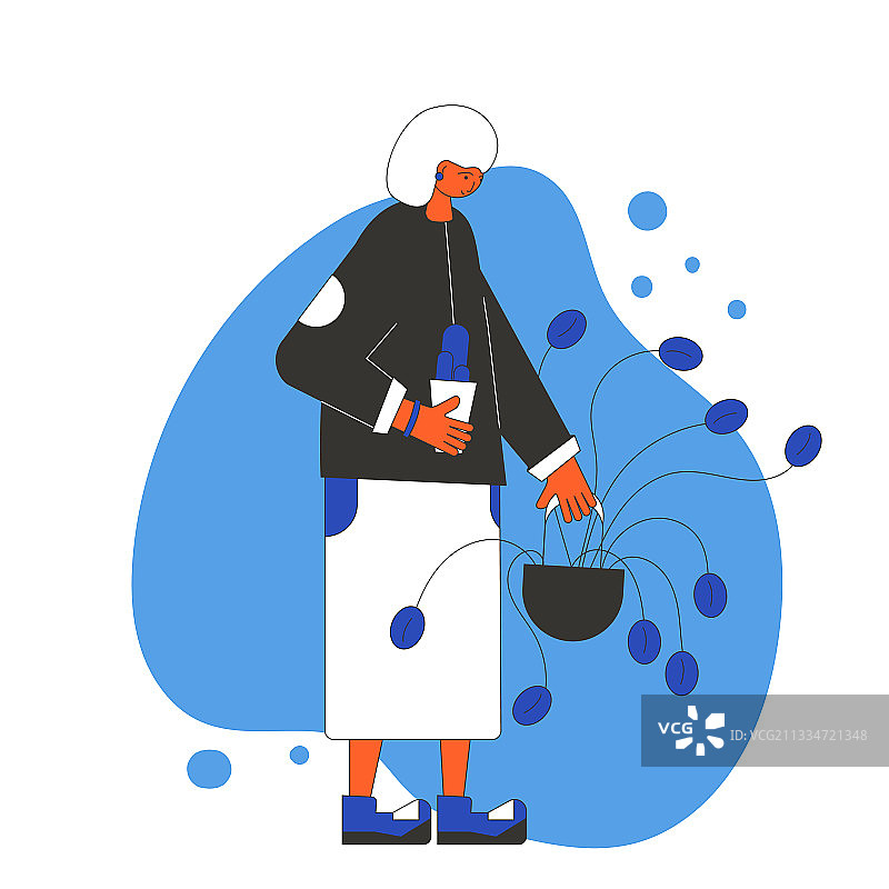 手捧室内盆栽的男人图片素材