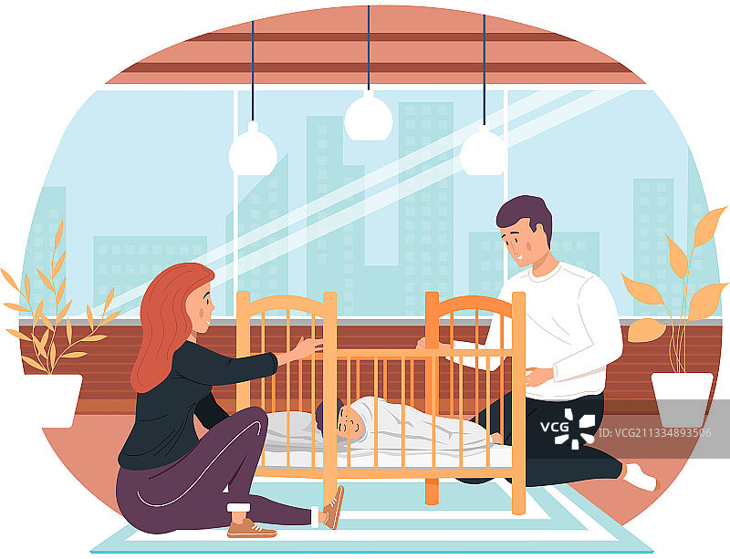 夫妻将孩子哄睡在摇篮里图片素材