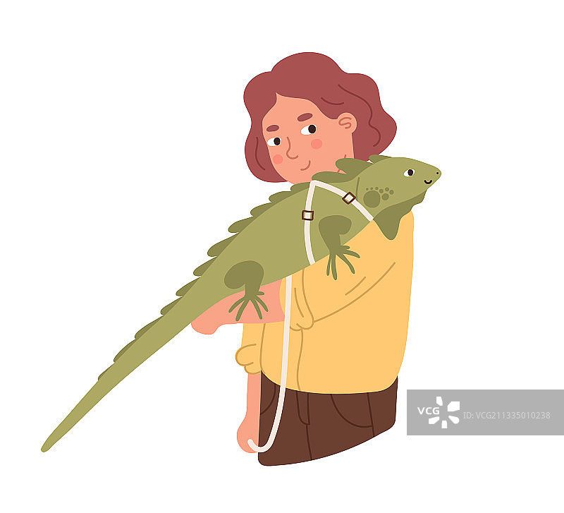 快乐微笑的孩子手中拿着鬣蜥图片素材